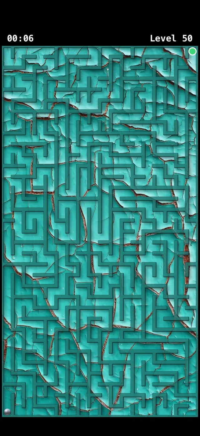 Tilt Maze at Level 50: a dense lattice of narrow corridors over cracked teal paint, with the same ball and exit almost lost in it